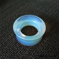 Double-flared tunnel opalite